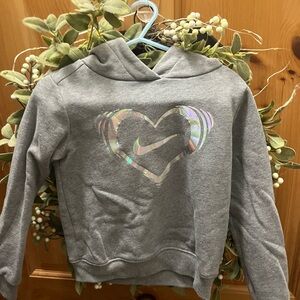 Grey Nike 3T hoodie.